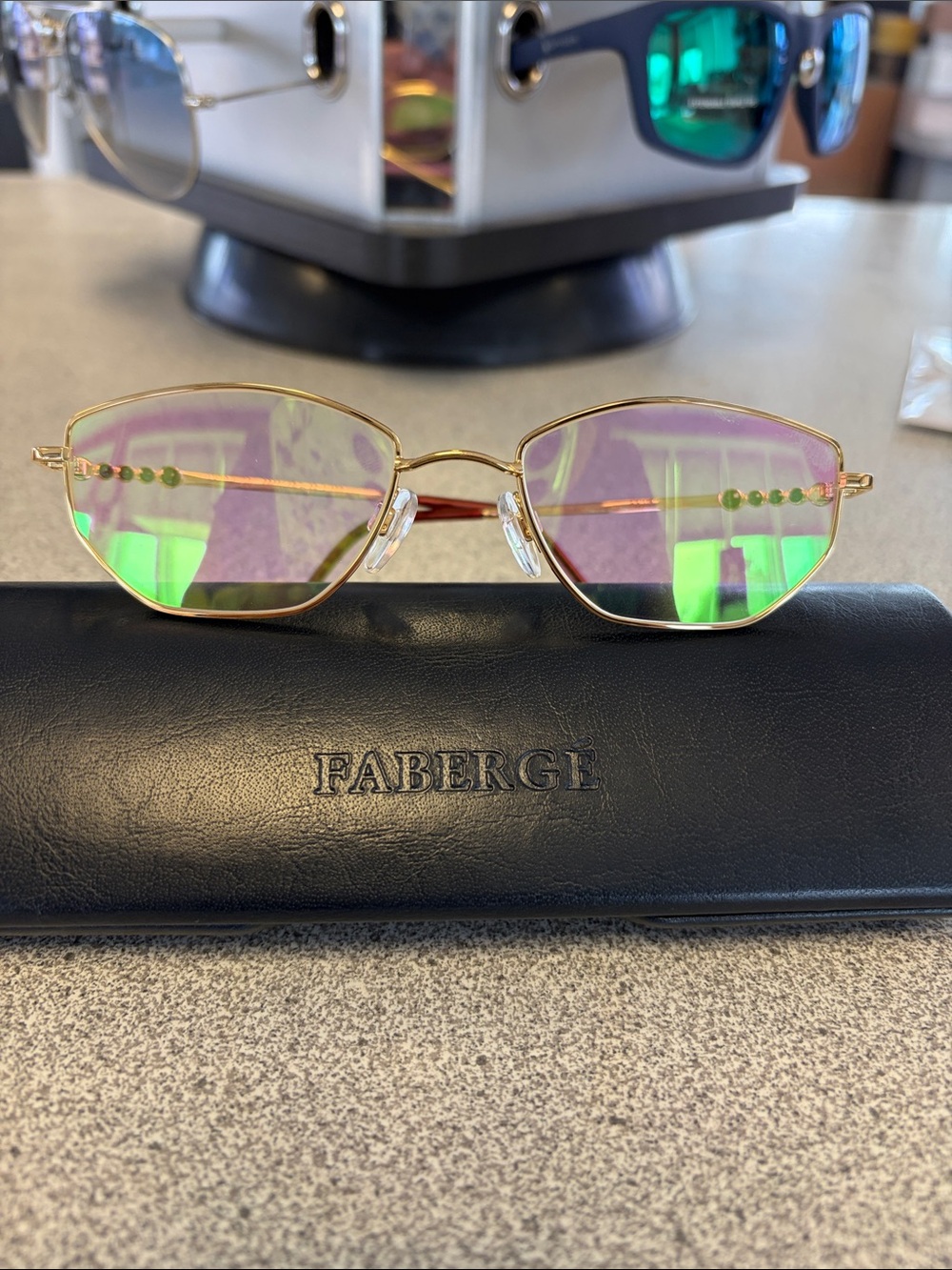 Faberge Vintage Gold Frame Sunglasses with Green and Purple Iridescent Lenses
